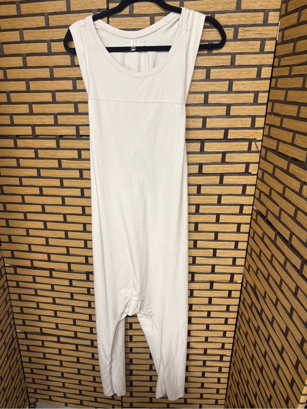 Free people movement tan Hot shot twisted onesie size medium